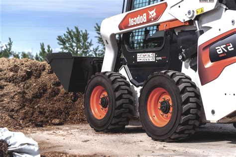 track skid steer vs wheel skid steer|tracked or wheeled skid steer.